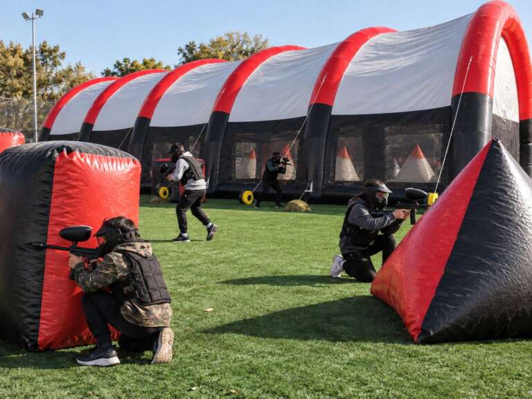 Inflatable paintball arena at an outdoor event